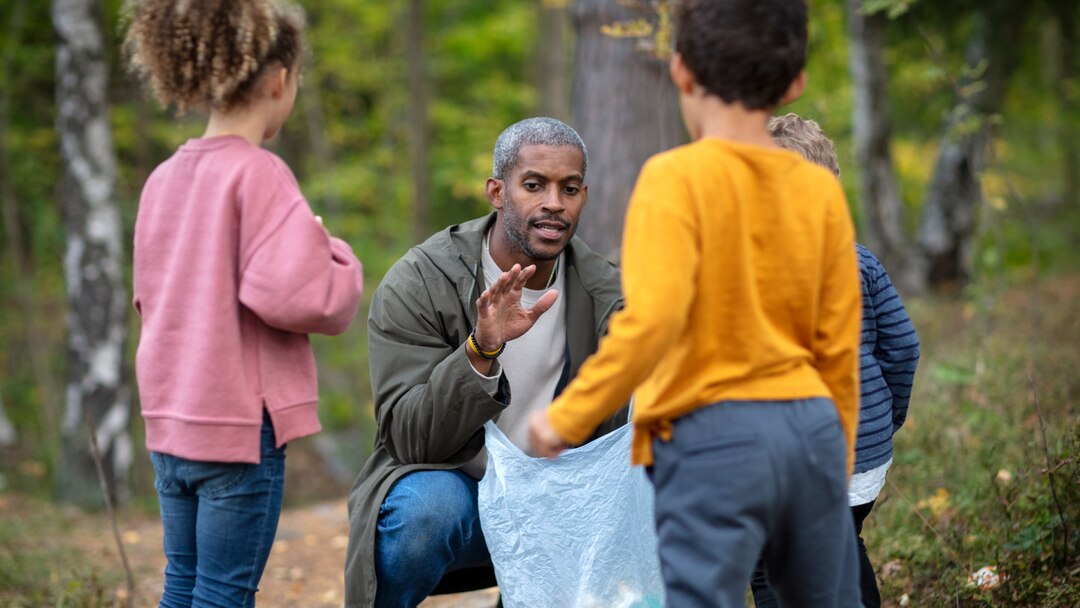 Kids With Father In Forest