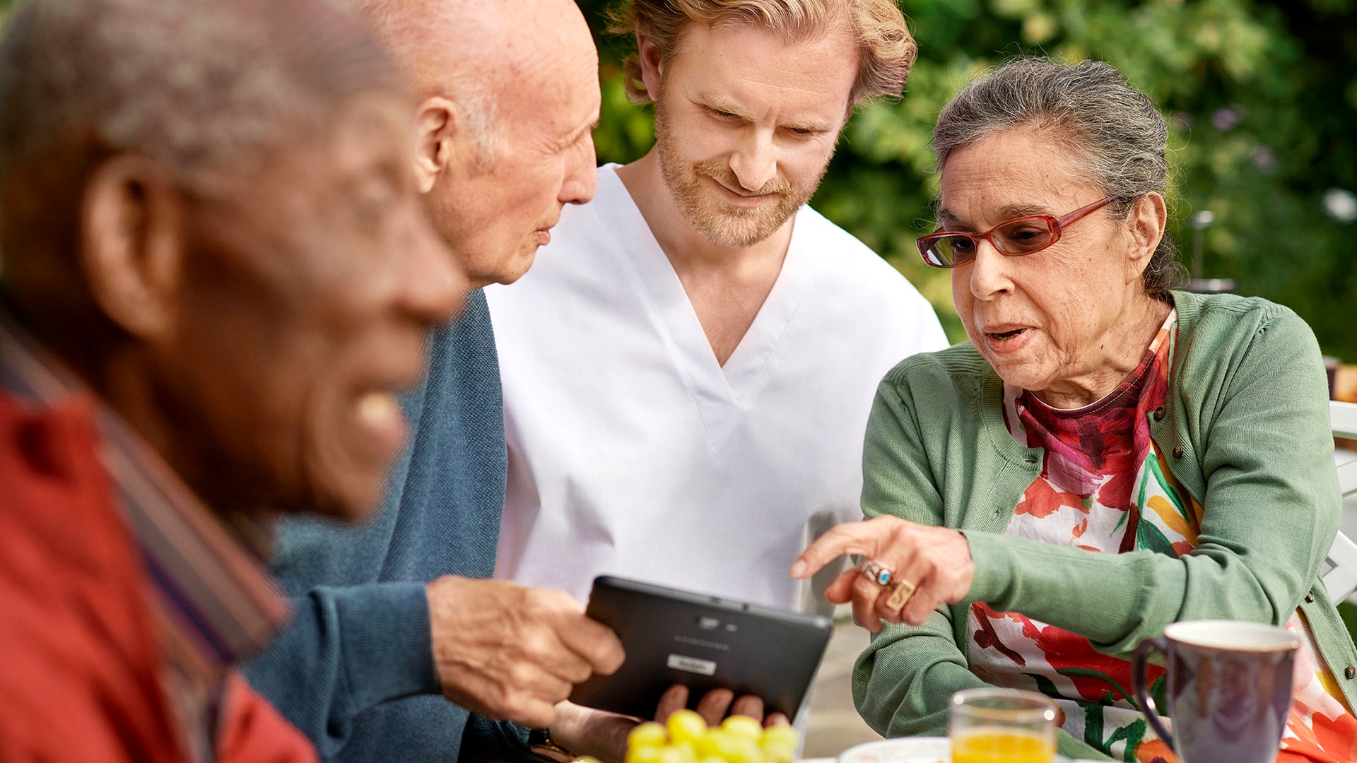 A nursing home resident walking in the garden