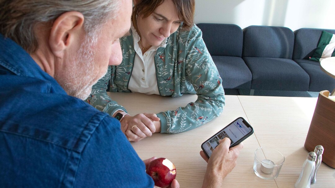 Woman And Man Smartphone Browsing