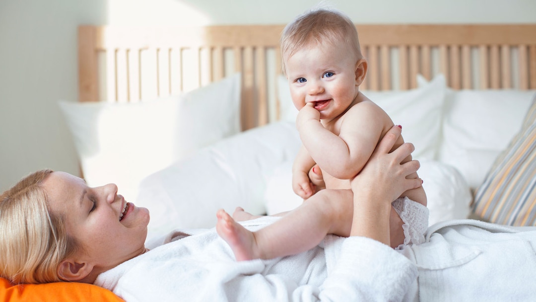 Mother With Baby Playing