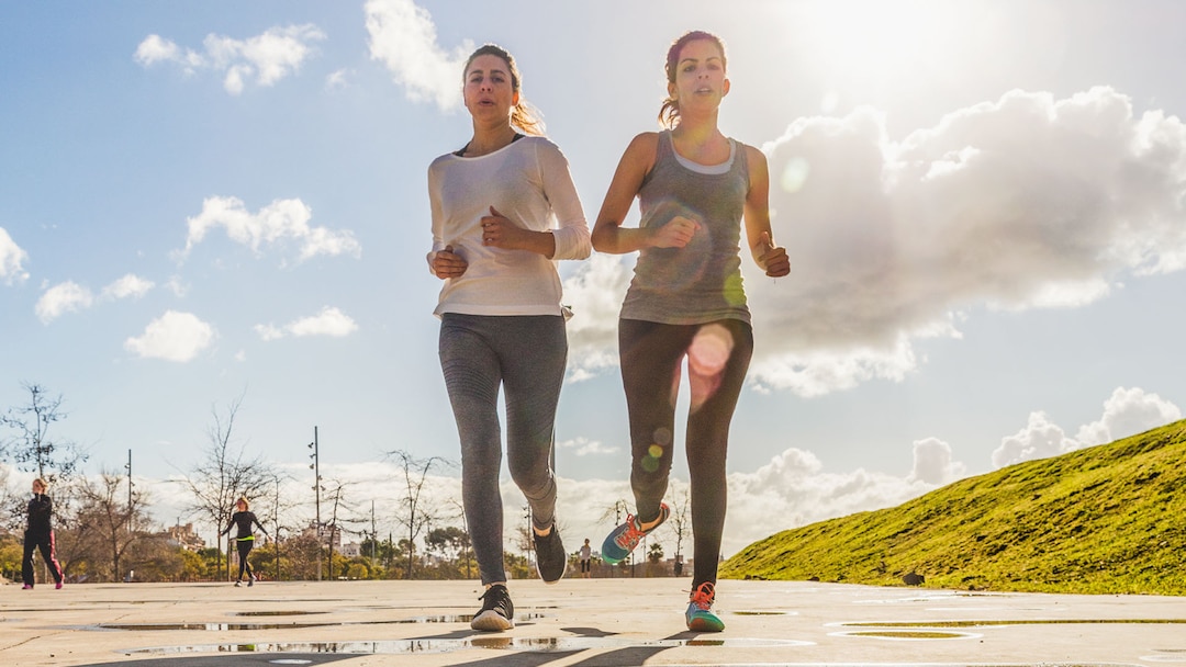 Two Young Women Running In Urban Area 3