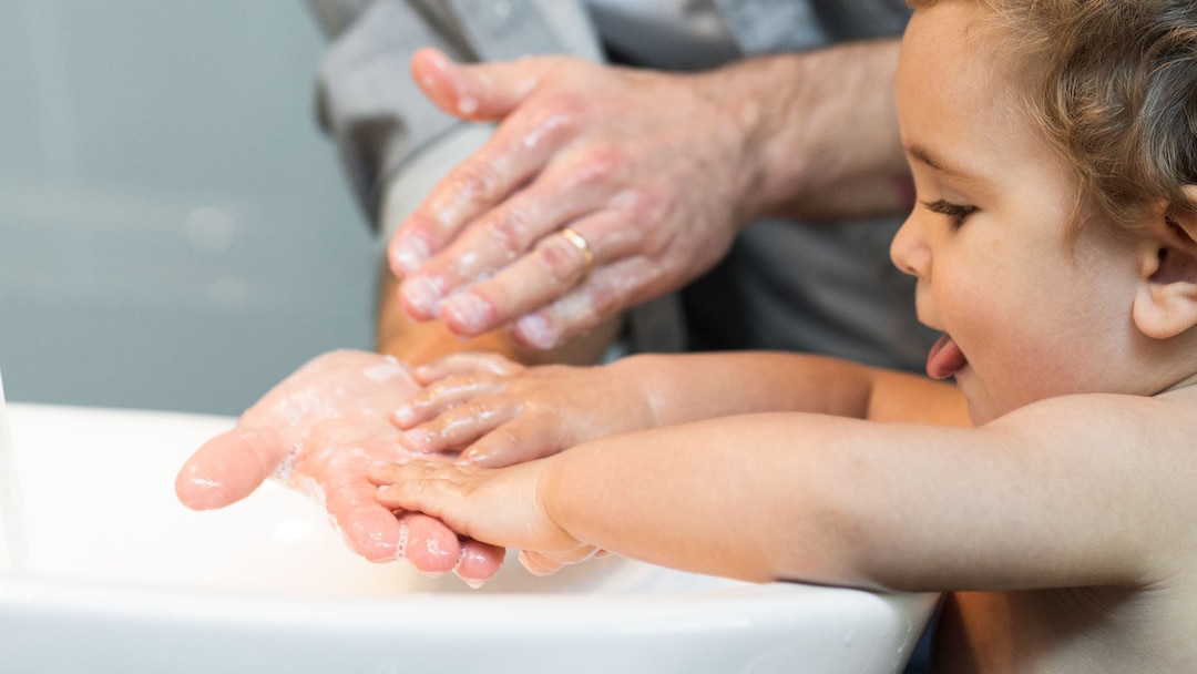 Baby Father Washing Hands In Bathroom01