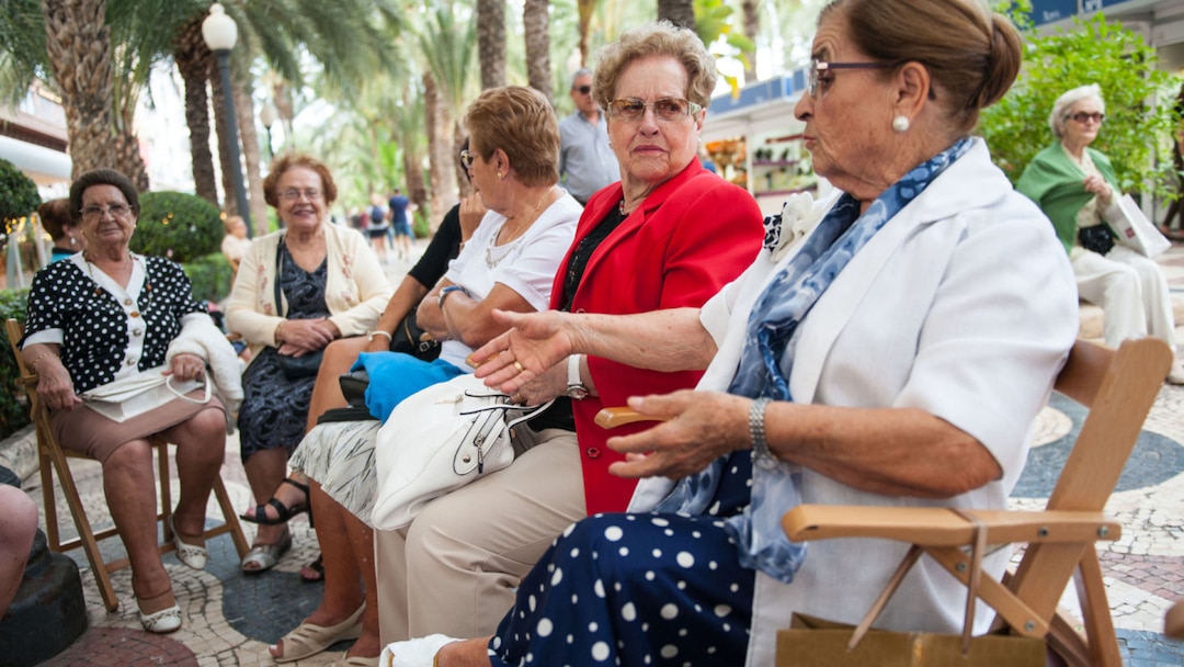 Elderly Women Sitting Outdoors